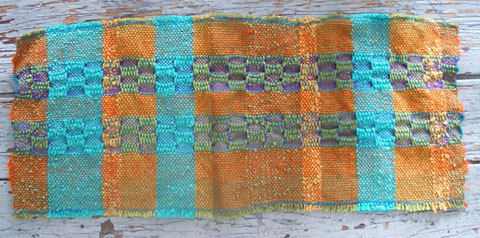 woven sample in blue, purple, orange, green